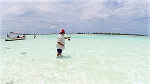 Franck Taunga Smith, an experienced flyfishing guide, practices his art in Kiritimati lagoon, Kiribati (Photo: Éric Clua).